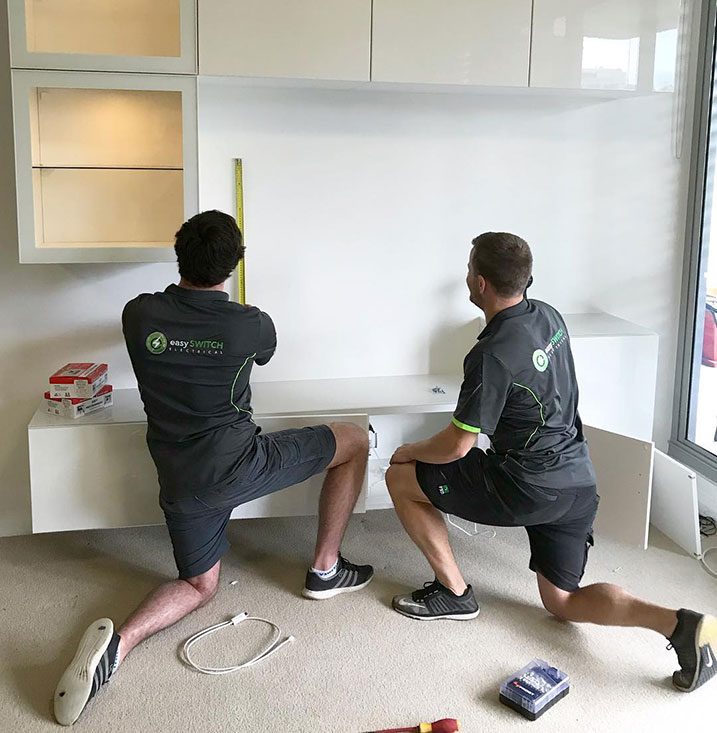 Our electricians performing an electrical installation.